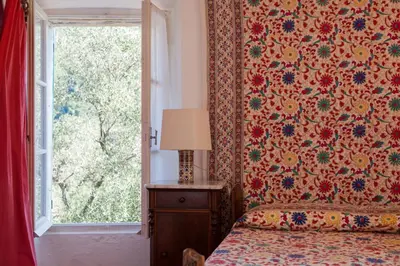 Letto o letti in una camera di Casa degli Olivi