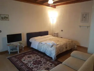 Letto o letti in una camera di Corte Pomponazza