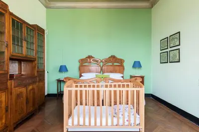 Letto o letti in una camera di Carlotta Flexyrent Apartment