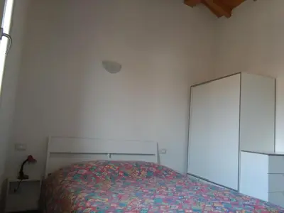 Letto o letti in una camera di Up b&b