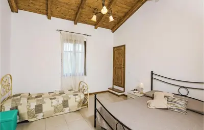 Letto o letti in una camera di Casa Di Francesca