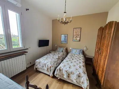 Letto o letti in una camera di Il Giardino della Musica