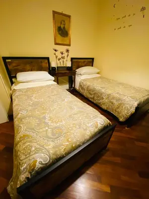 Letto o letti in una camera di Amici Miei Rooms