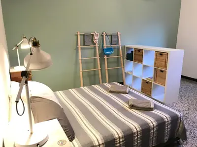 Letto o letti in una camera di Appartamento Madeleine