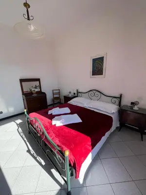 Letto o letti in una camera di Appartamento Orfeo