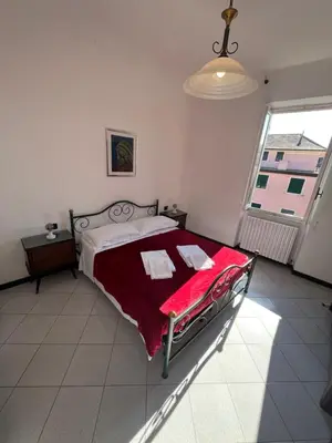 Letto o letti in una camera di Appartamento Orfeo