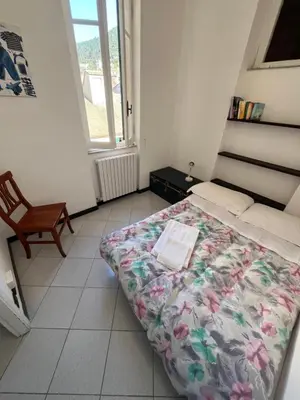 Letto o letti in una camera di Appartamento Orfeo