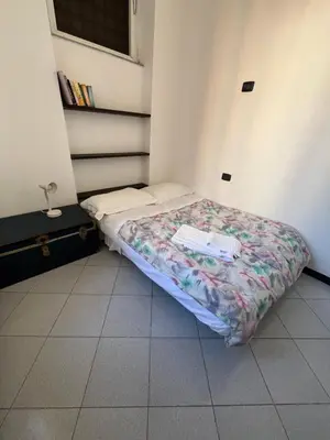 Letto o letti in una camera di Appartamento Orfeo