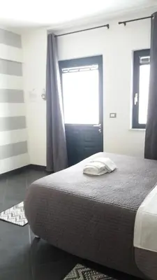 Letto o letti in una camera di Affittacamere arabafenice