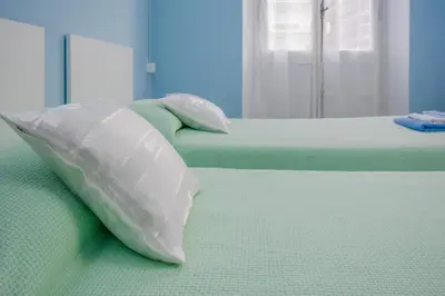 Letto o letti in una camera di Cà da Nalda