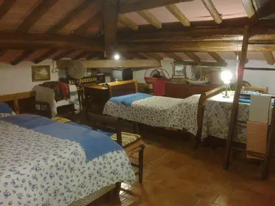 Letto o letti in una camera di Agriturismo Antica Golena