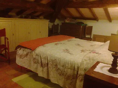 Letto o letti in una camera di Agriturismo Antica Golena