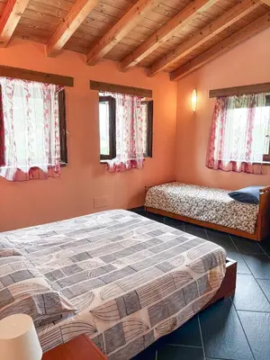 Letto o letti in una camera di Agriturismo Casa Casoni