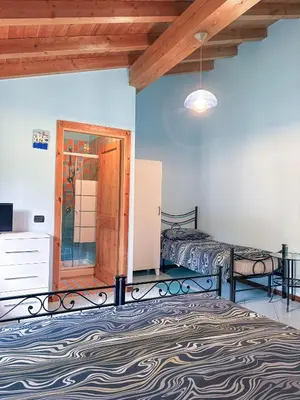 Letto o letti in una camera di Agriturismo Casa Casoni