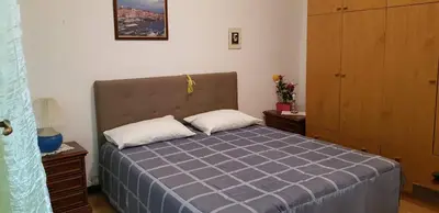 Letto o letti in una camera di Casa Maria