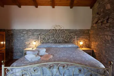 Letto o letti in una camera di Cà di Viola