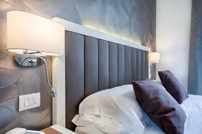 Letto o letti in una camera di Hotel Monte Rosa