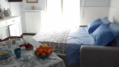 Letto o letti in una camera di Studio Flat Tigullio & Garage