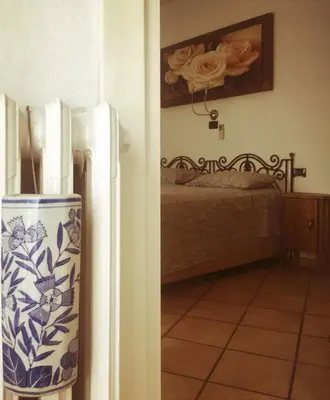 Letto o letti in una camera di Locanda Agnella