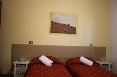 Letto o letti in una camera di Albergo Filietto