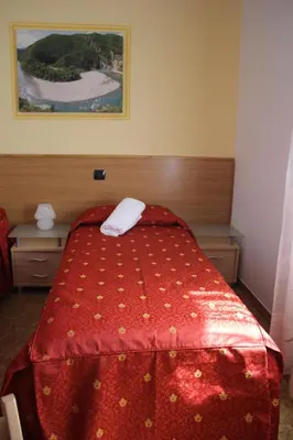 Letto o letti in una camera di Albergo Filietto