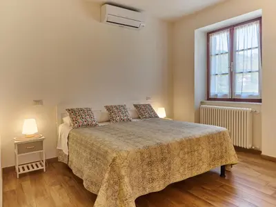 Letto o letti in una camera di Cà del fornello