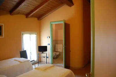 Letto o letti in una camera di B&B Sant'Antonio