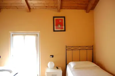 Letto o letti in una camera di B&B Sant'Antonio