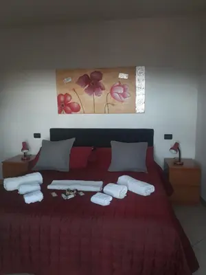 Letto o letti in una camera di Affittacamere Da Luca