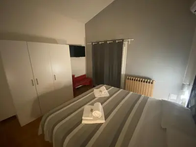 Letto o letti in una camera di Casa Bellodi