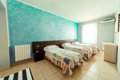 Letto o letti in una camera di Cristal Rooms