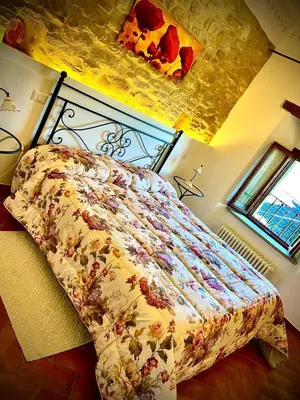 Letto o letti in una camera di Antica Corte Casa Marini