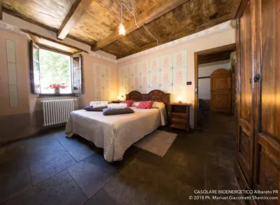 Letto o letti in una camera di Il Casolare Bioenergetico