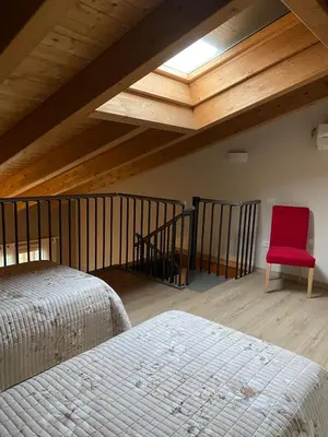 Letto o letti in una camera di B&B Cascina Sagrestia