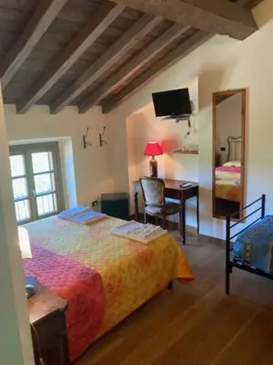 Letto o letti in una camera di Agriturismo Campo del Pillo