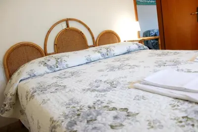 Letto o letti in una camera di Primario