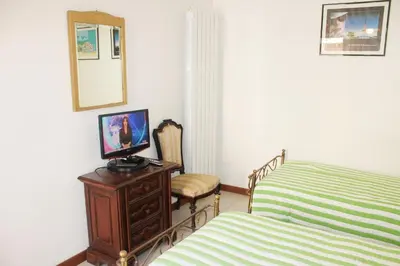 TV o dispositivi per l'intrattenimento presso Appartamento Primula Rossa