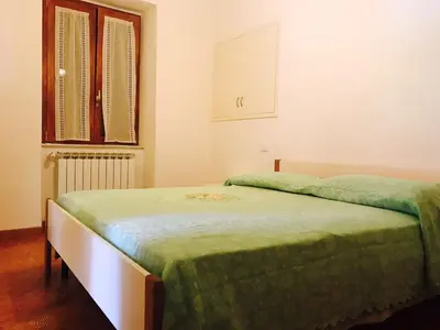 Letto o letti in una camera di Appartamento Armonia