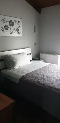 Letto o letti in una camera di Hotel Sporting