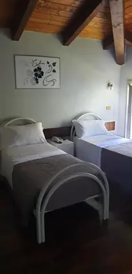 Letto o letti in una camera di Hotel Sporting