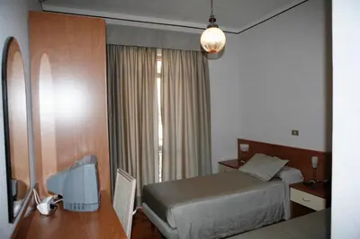 Letto o letti in una camera di Albergo Amici