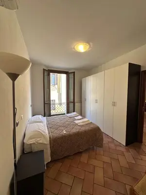 Letto o letti in una camera di Aselli Palace
