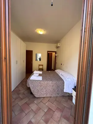 Letto o letti in una camera di Aselli Palace