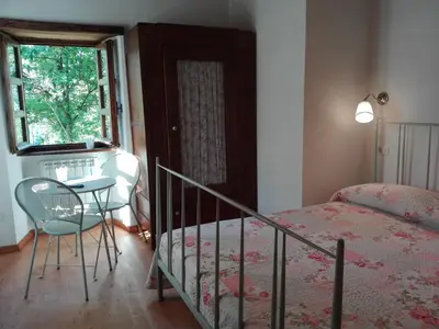 Letto o letti in una camera di Casa Millin