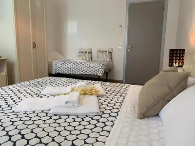 Letto o letti in una camera di Affittacamere Il Borgo