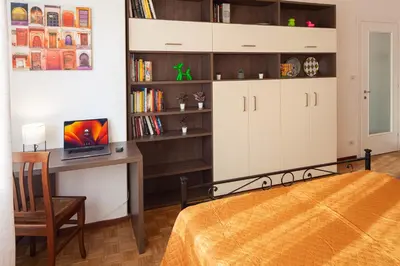 Letto o letti in una camera di Serena House
