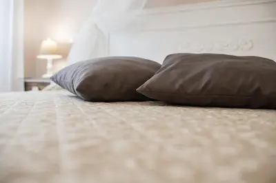 Letto o letti in una camera di Un soffio dal cielo