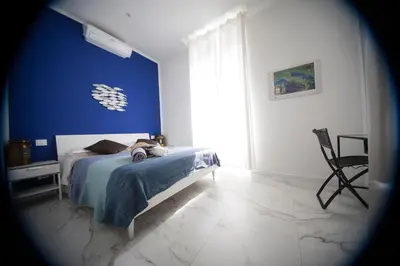 Letto o letti in una camera di La Casa del Vento
