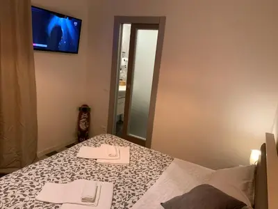 Letto o letti in una camera di Affittacamere LevantoMare