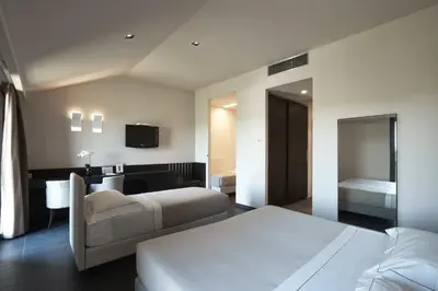 Letto o letti in una camera di Casalgrande Hotel